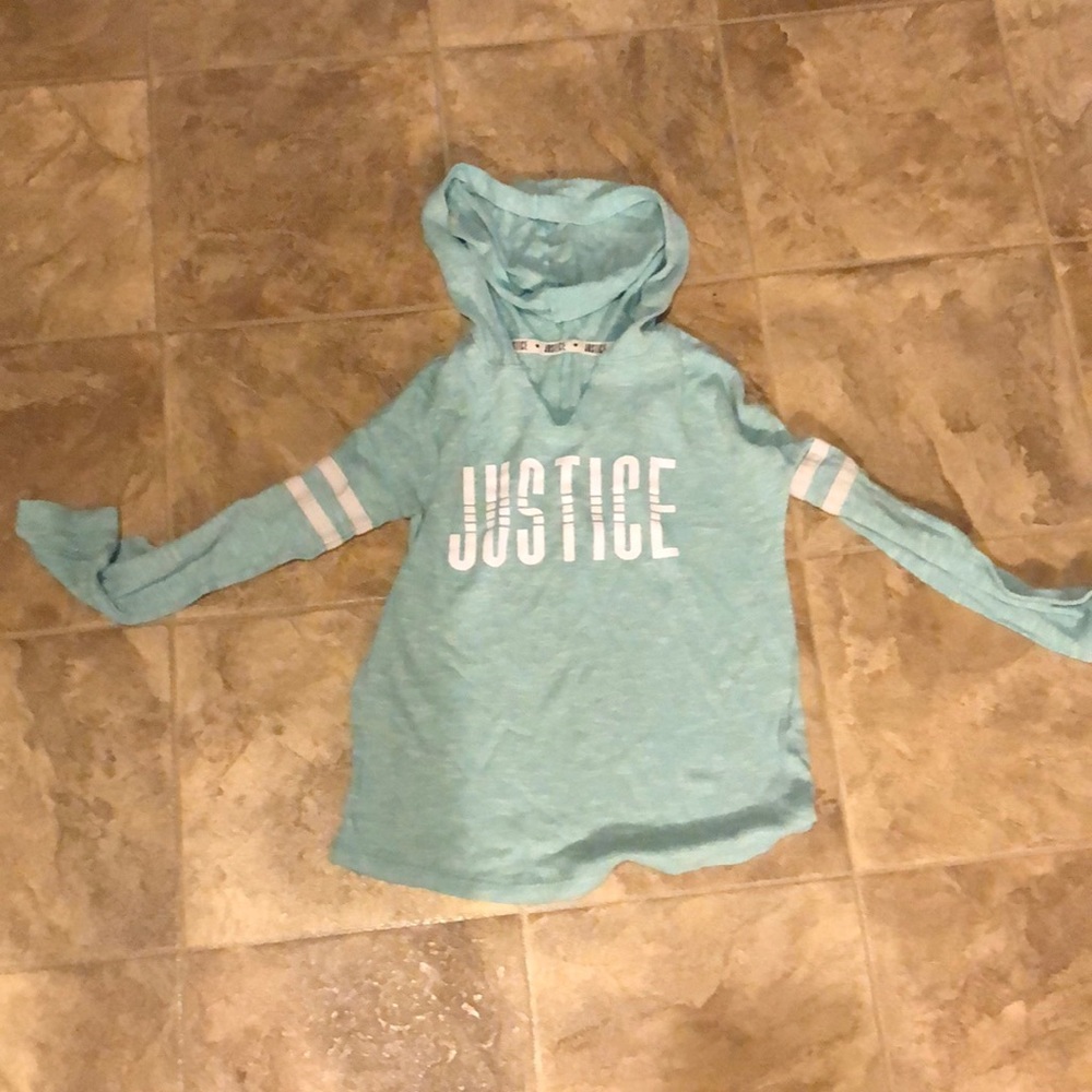 A teal longsleeve justice shirt